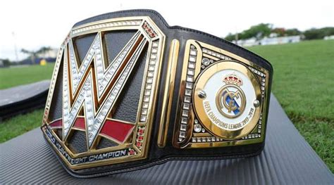 Real Madrid receive WWE Championship belt from Triple H | Football News ...