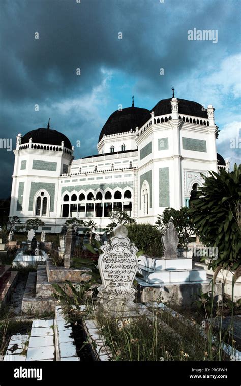 Grand Mosque of Medan with gravestones in Medan, Sumatra, Indonesia ...