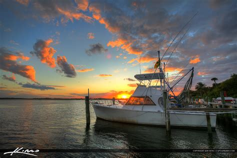 Ponce Inlet Marina Dock Fishing Boat During Sunset on Water