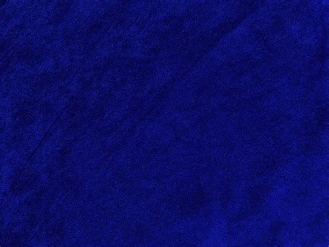 Blue velvet fabric texture used as background. Empty blue fabric ...