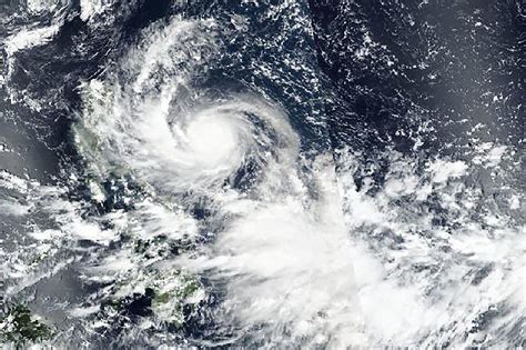 Powerful Typhoon Hits North Philippines, Thousands Evacuated - Bloomberg