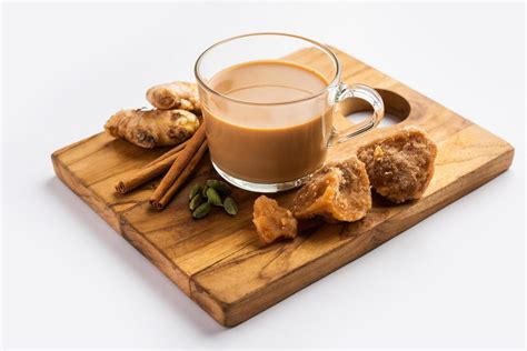 Jaggery tea or Gur ki chai with ingredients like gud, ginger or adrak ...