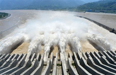 China's Three Gorges Dam releases huge torrent of water as it opens for ...