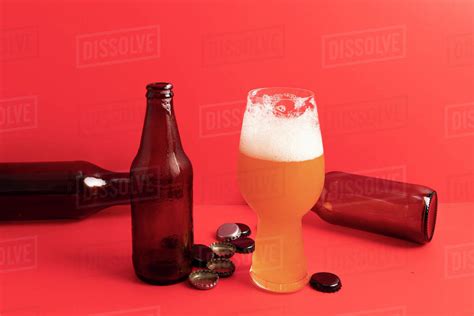 IPA beer glass and various bottles - Stock Photo - Dissolve