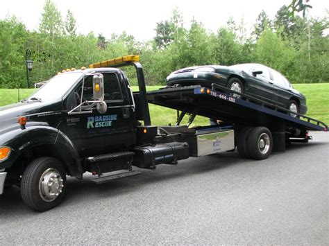 Car on Tow Truck - Free Stock Photo by Katharine Sparrow on Stockvault.net