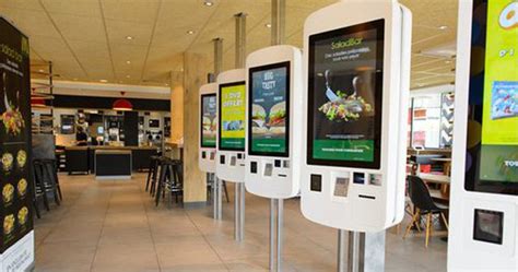 McDonald's tests cash-accepting self-order kiosks; will retrofits be ...