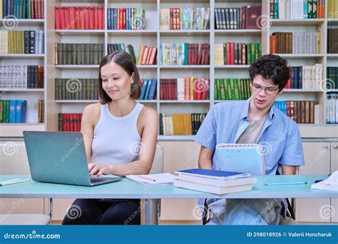 College Students Guy and Girl Study in Library Stock Photo - Image of ...