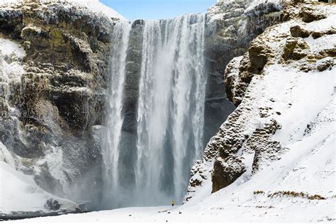 Skogafoss, Iceland in winter. | Skogafoss, Waterfall, Natural landmarks