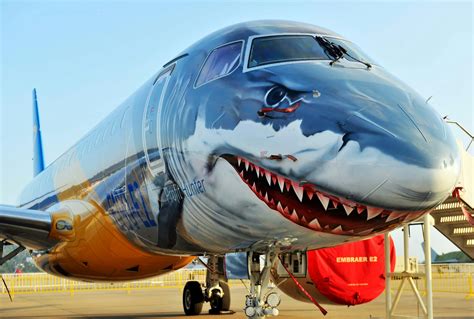 Embraer's new plane looks like a shark and has no middle seats - Lonely ...