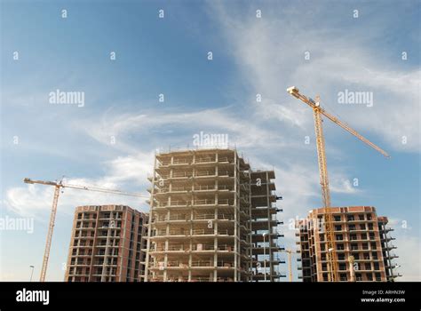 Construction site with cranes Stock Photo - Alamy