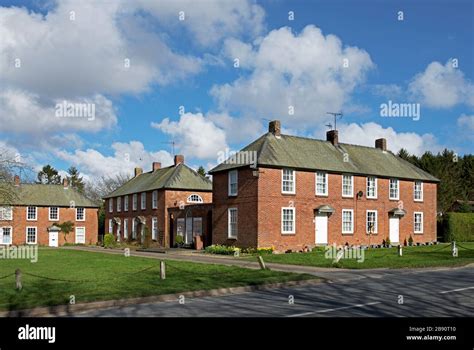 Houses in the estate village of Sledmere, East Yorkshire, England UK ...