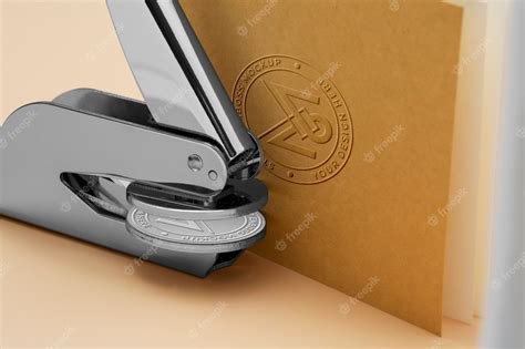 Premium PSD | Metallic stamp with embossed logo effect on paper