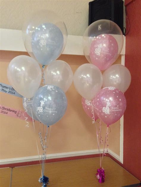 Pretty joint Christening balloon decorations in pale pink and pale blue ...