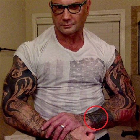 Dave Bautista's 33 Tattoos & Their Meanings - Body Art Guru