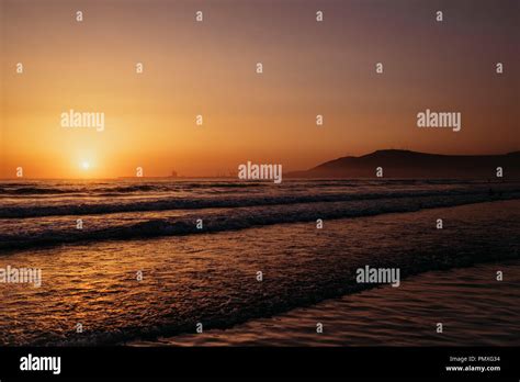 On the beach in Agadir, Morocco at Sunset Stock Photo - Alamy