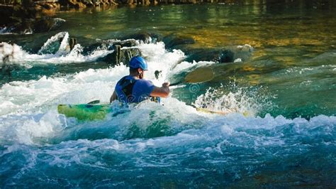 Man Kayaking Upstream, Paddling on the Turbulent River Stock Image ...