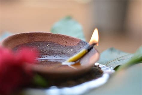 Close Up of a Diya Lamp Lightning with Ghee or Oil Stock Photo - Image ...