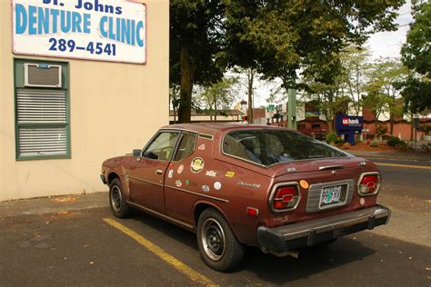 OLD PARKED CARS.: 1976 Datsun F10 Hatchback.