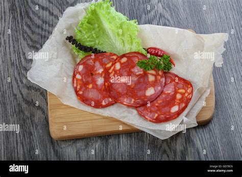 Chorizo sausage with pepper and salad leaves Stock Photo - Alamy