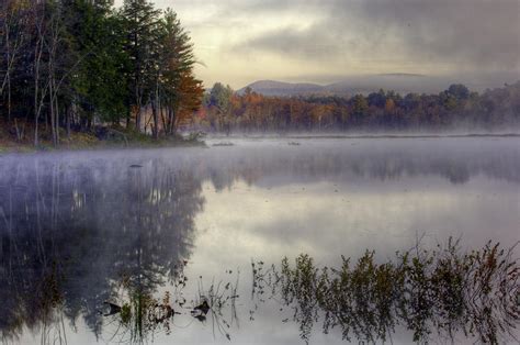 Early morning fog Photograph by Allan Rube