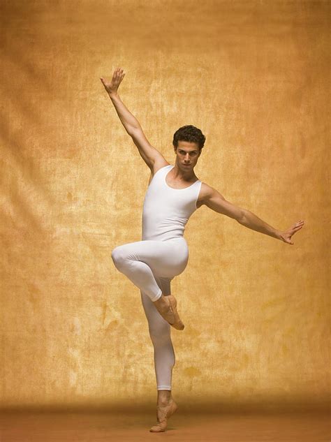 Man Performing Ballet Pose With Arms by Pm Images