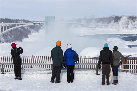 Niagara Falls has frozen over as extreme winter weather continues ...