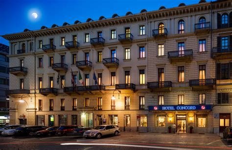 the hotel concord is lit up at night