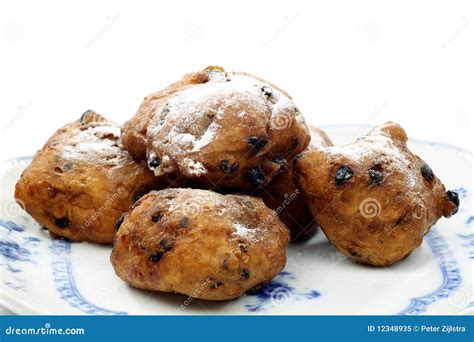 Powdered Dutch oliebollen stock image. Image of traditional - 12348935