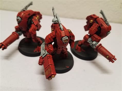 My first 100% finished unit. Farsight Enclave Stealth Suits! I may not ...