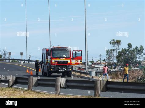 Cape Town fire engine at work in an African township with people Stock ...