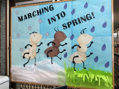 Marching Into Spring library bulletin board | Spring bulletin boards ...