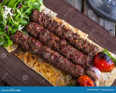 Iraqi Beef Seekh Kabab Platter Served In Dish Side View On Wooden Table ...