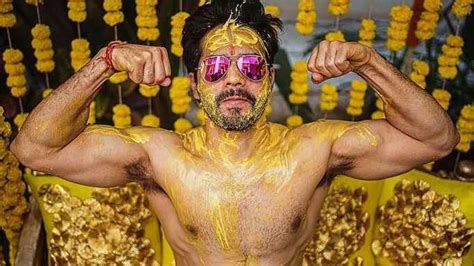 Varun Dhawan flexes muscles in photos from haldi ceremony, poses with ...