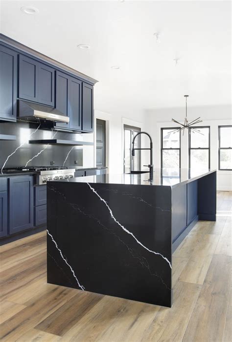 Black Waterfall Countertop | Waterfall island kitchen, Black kitchen ...