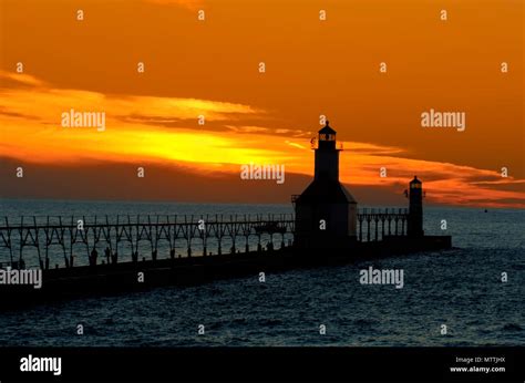 St. Joseph North Pier Lights in St. Joseph, Michigan at sunset Stock ...