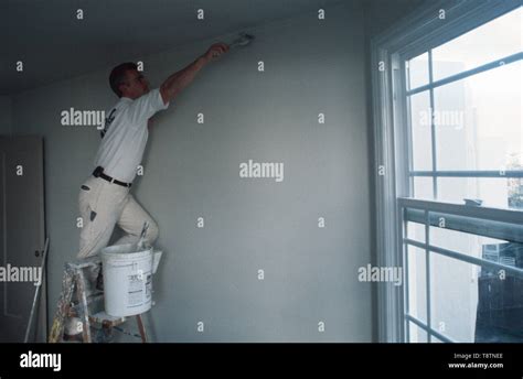 House Painter With Tools Stock Photo - Alamy