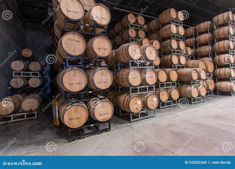 Wine barrel storage editorial stock photo. Image of round - 55205368