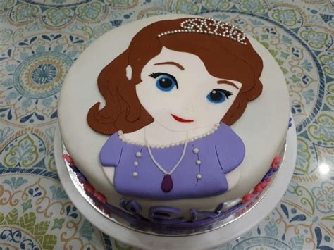 there is a cake decorated with a princess on it