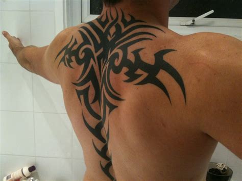 50 Tribal Tattoos For Men - InspirationSeek.com