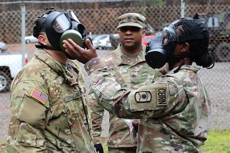 Active, Reserve Soldiers cough, sneeze and learn during CBRN training