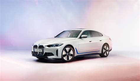 BMW i4 revealed, four-door EV promises 300-mile range - CNET