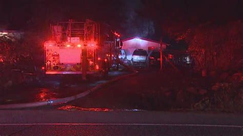 Body found after fire in Auburn trailer home near Lake Dolloff | king5.com