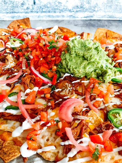 PULLED PORK NACHOS - thecommunalfeast.com