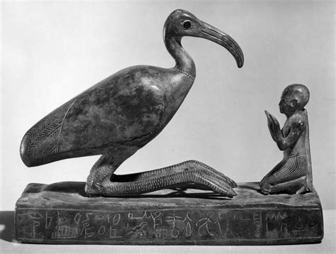 Group statue of Thoth-ibis and devotee on a base inscribed for ...