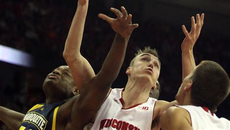 Wisconsin holds off Marquette to improve to 10-0