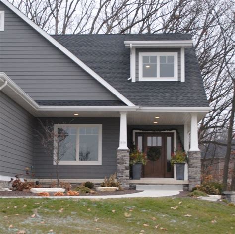 dark gray vinyl siding and white trim houses | Here is our ...