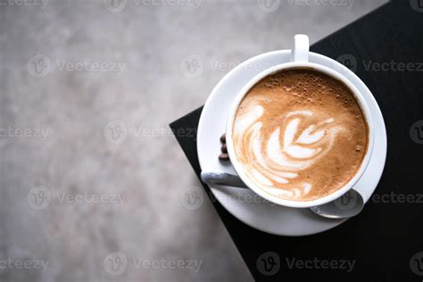 Latte Art coffee in coffee shop 8031337 Stock Photo at Vecteezy