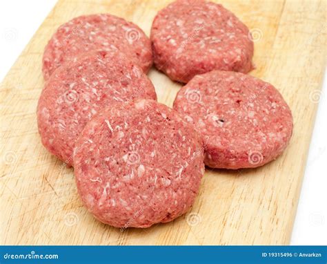 Raw beef burgers stock photo. Image of burger, uncooked - 19315496