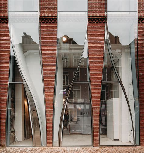 The Looking Glass Facade Renovation / UNStudio | Brick architecture ...