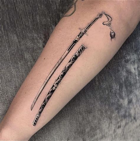 65 Epic Sword Tattoo Ideas: Unleash Your Inner Warrior - ARTWOONZ